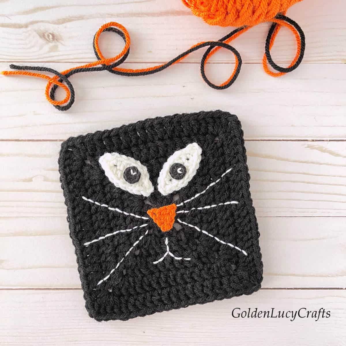 Crochet black cat square for Halloween.
