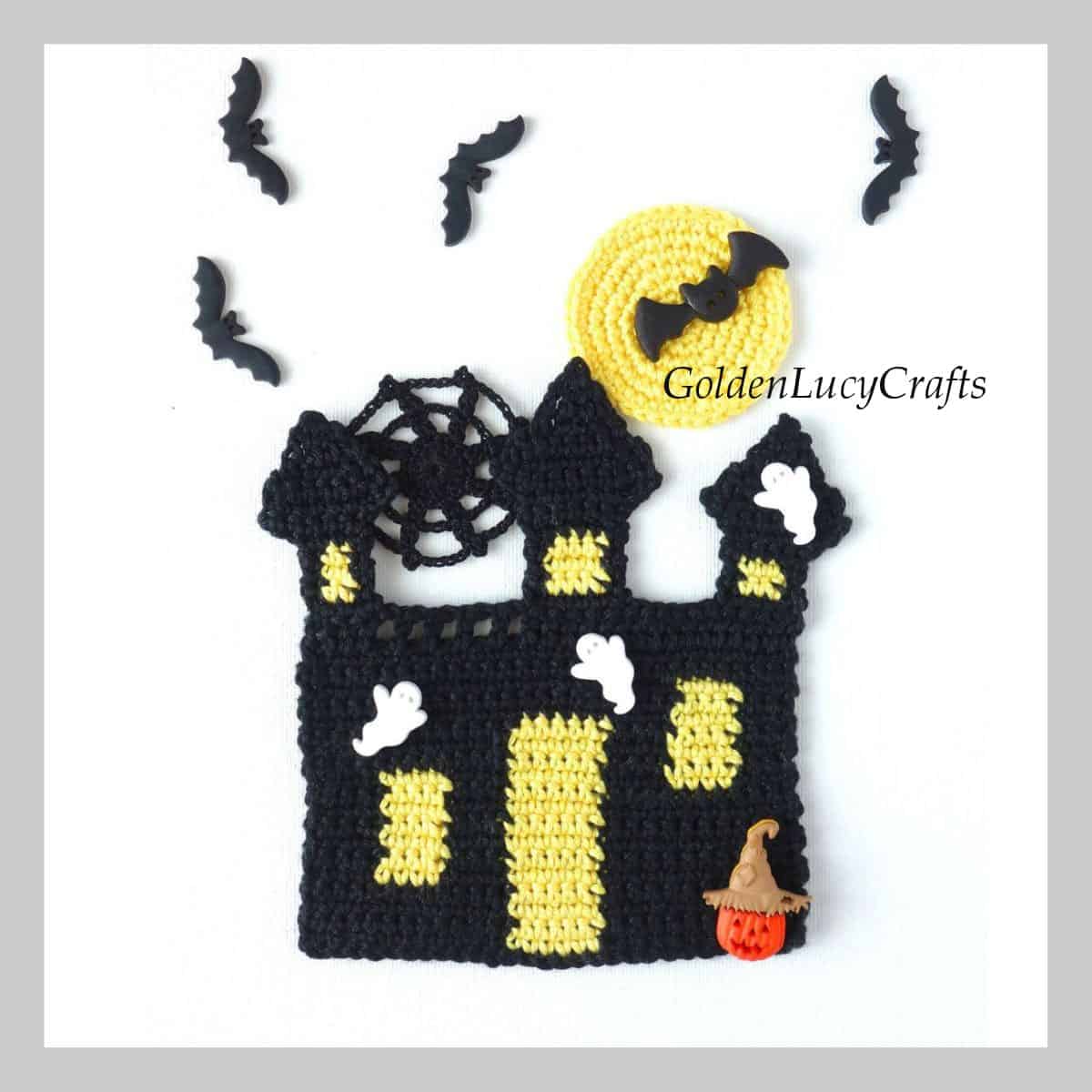 Crocheted haunted house applique.