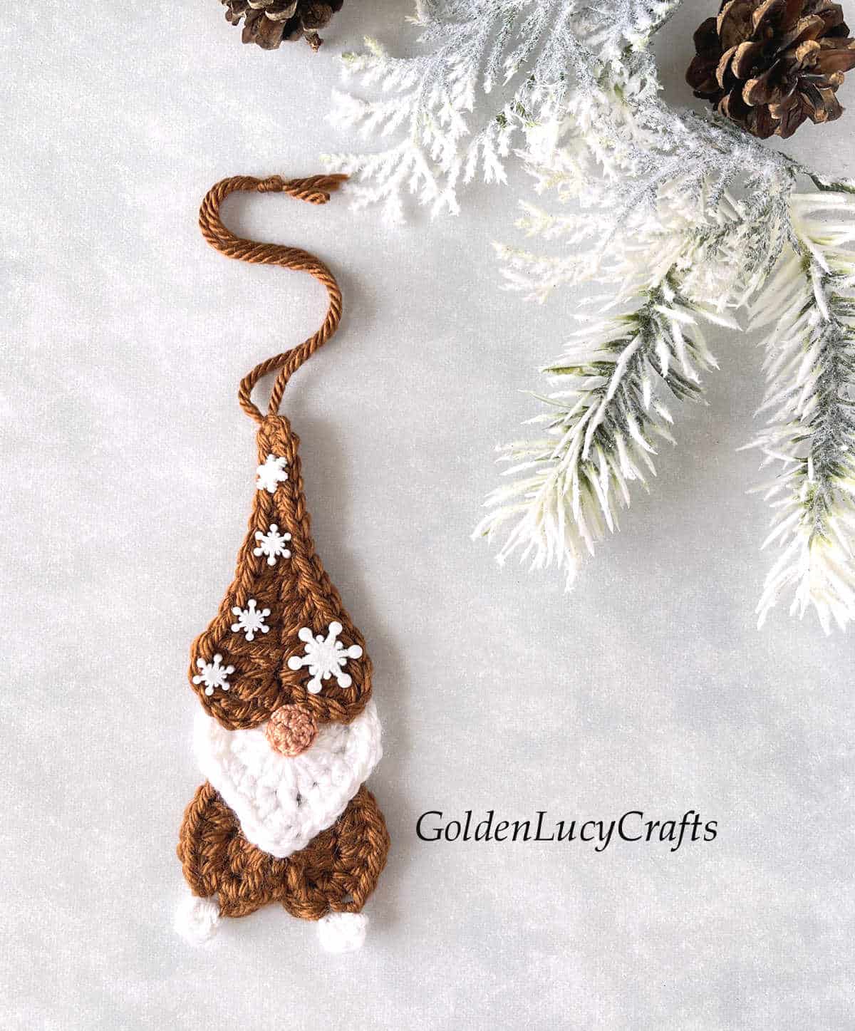 Crochet gingerbread gnome ornament.