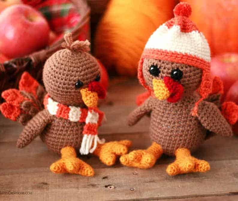Two crocheted turkey coasters.