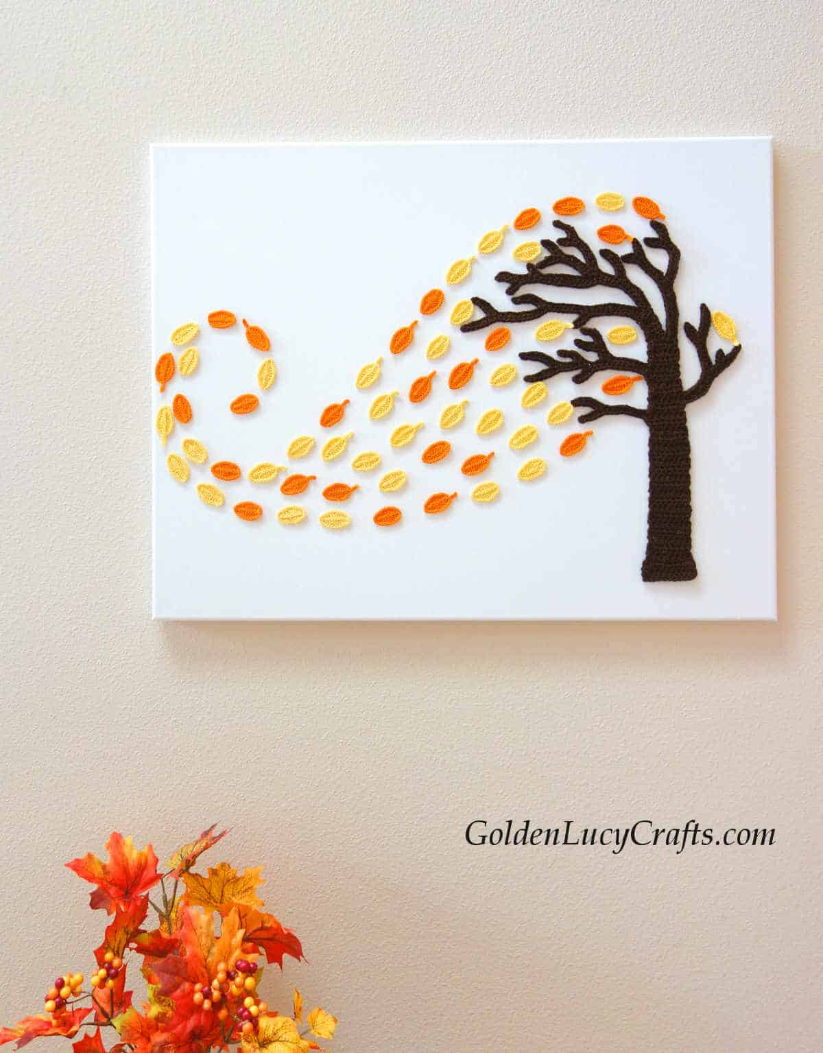 Crochet wall art fall tree and wind.
