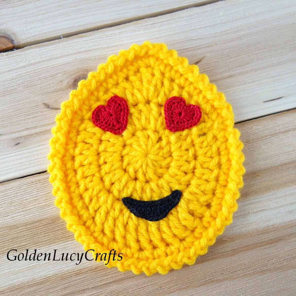 Crochet Easter egg emoji heart eyes.