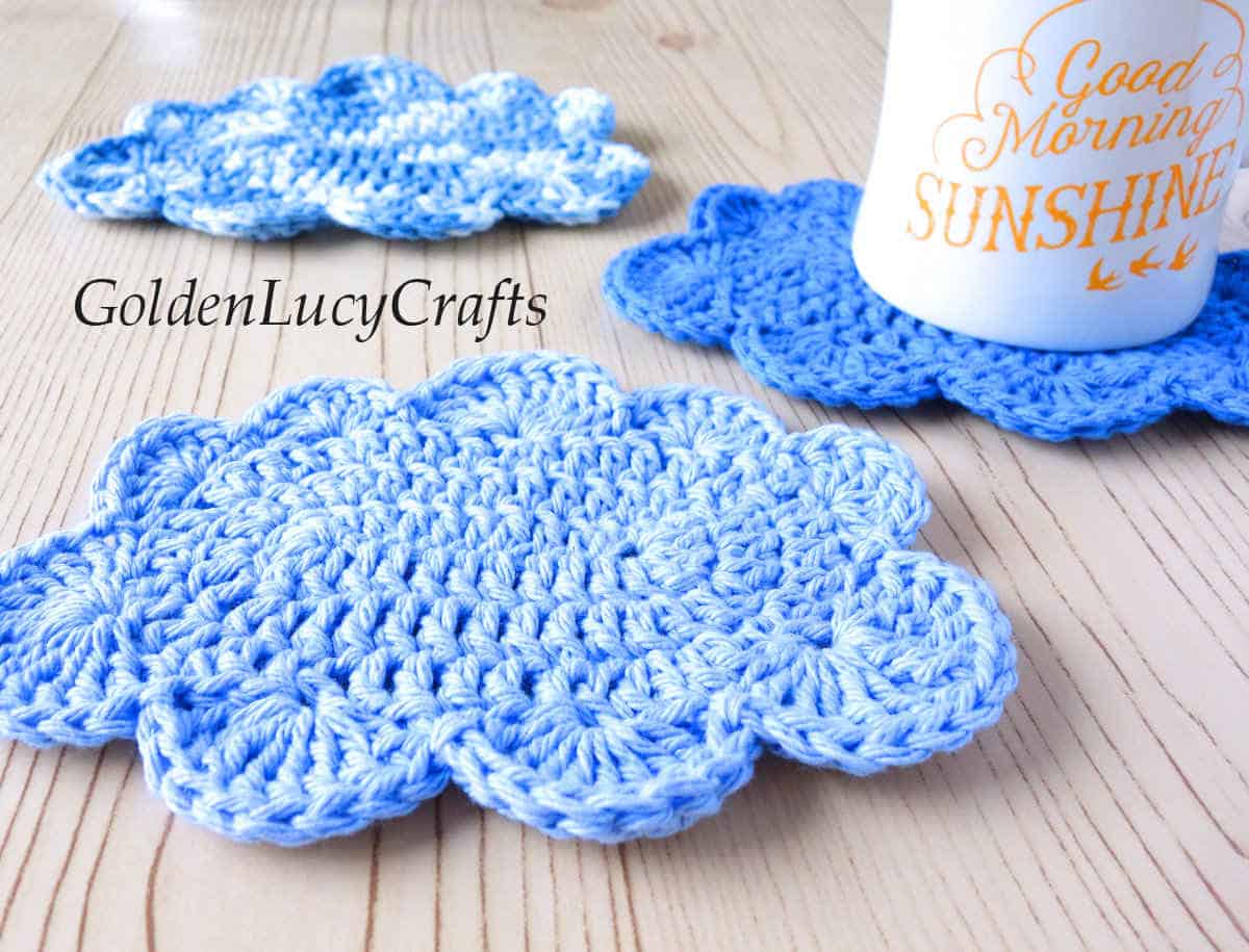 Crochet coasters in the shape of clouds.