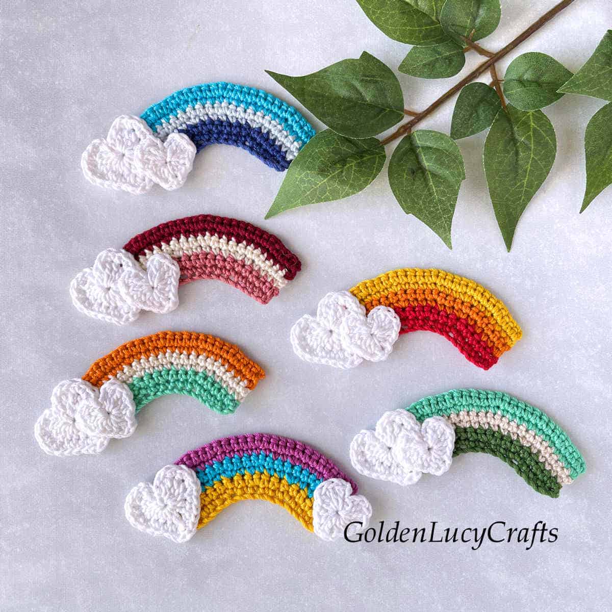 Six crochet rainbow appliques.