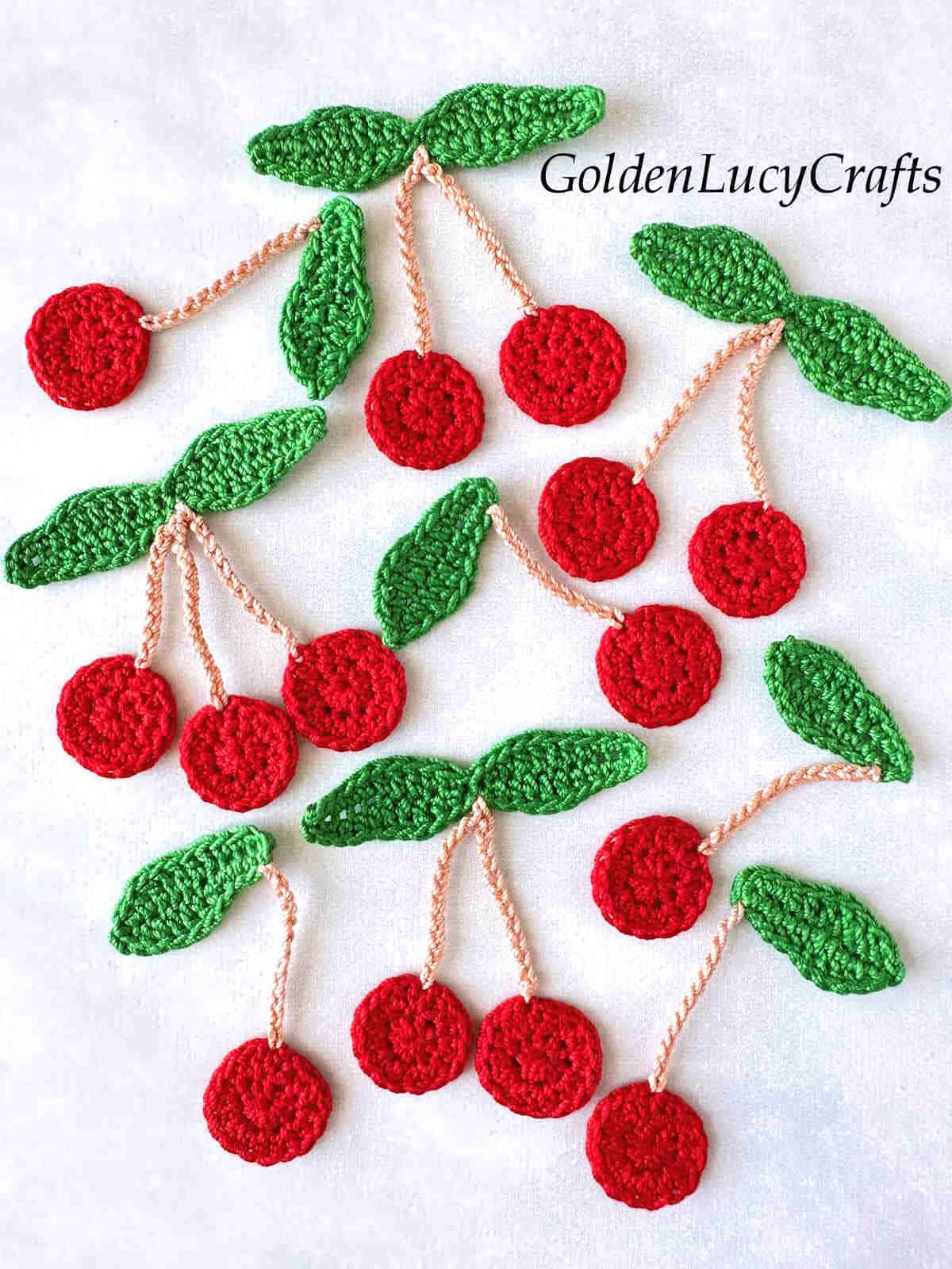 Crochet cherry appliques.