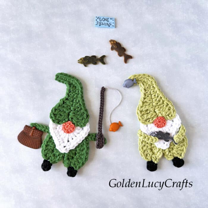 Two crochet fishing gnomes.
