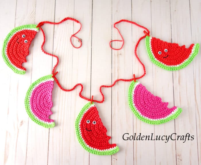 Crochet watermelon bunting for summer home decor.