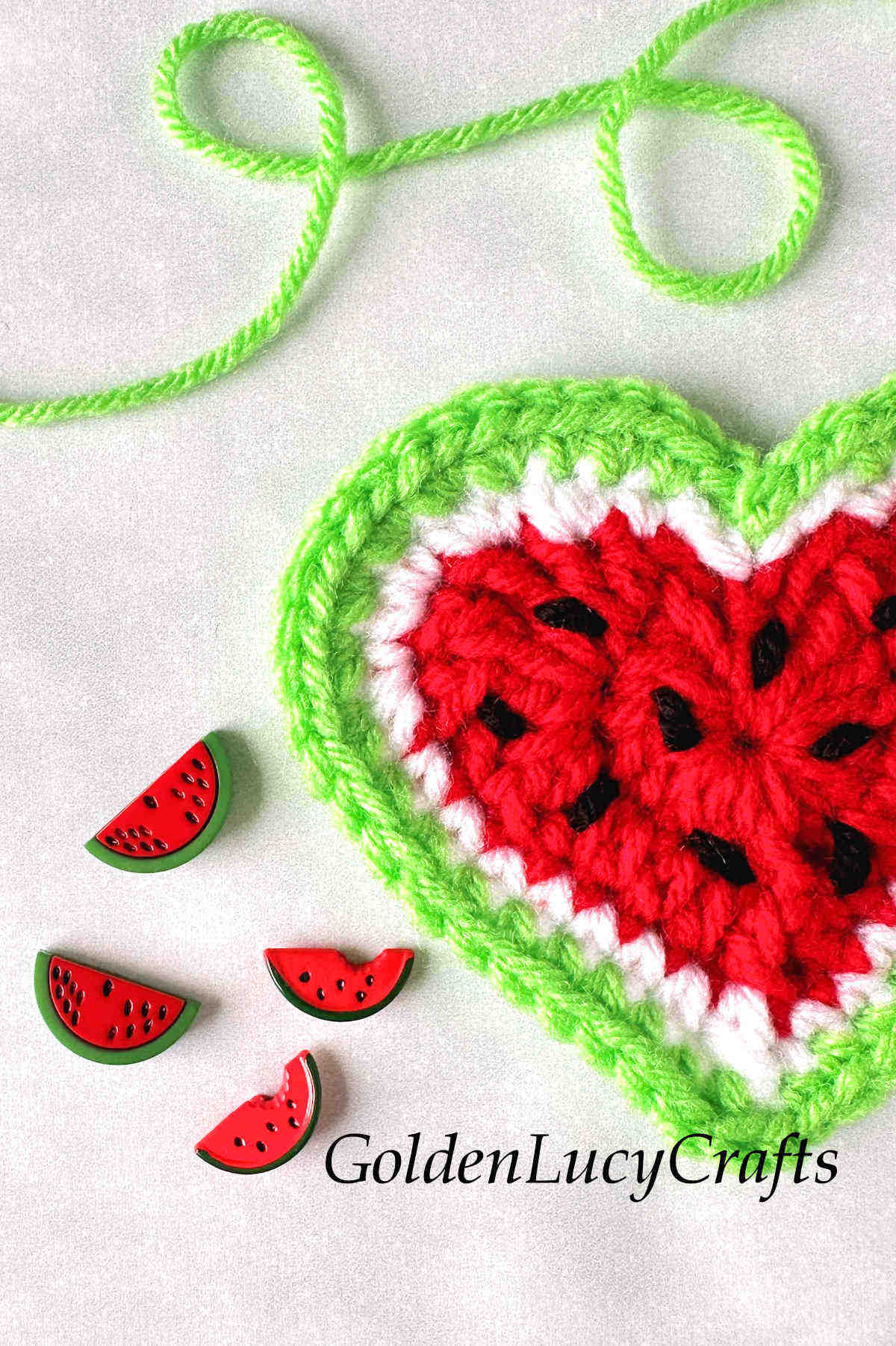Crochet watermelon heart close up picture.