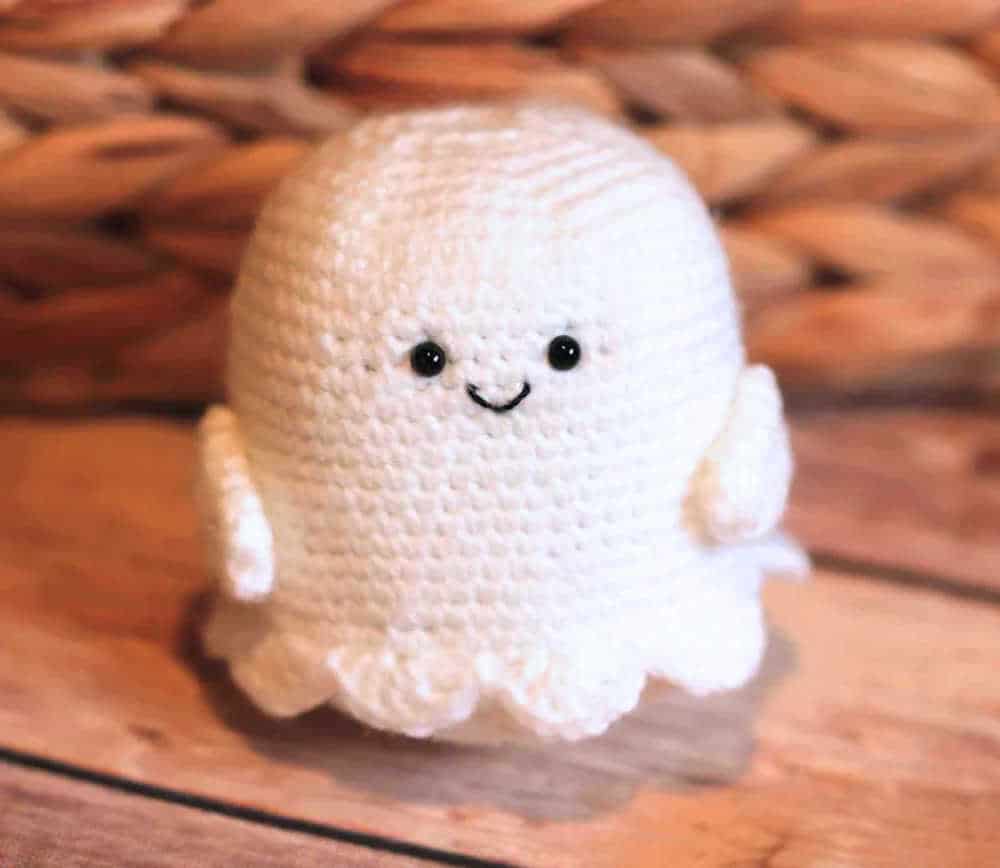 Crochet white ghost amigurumi.