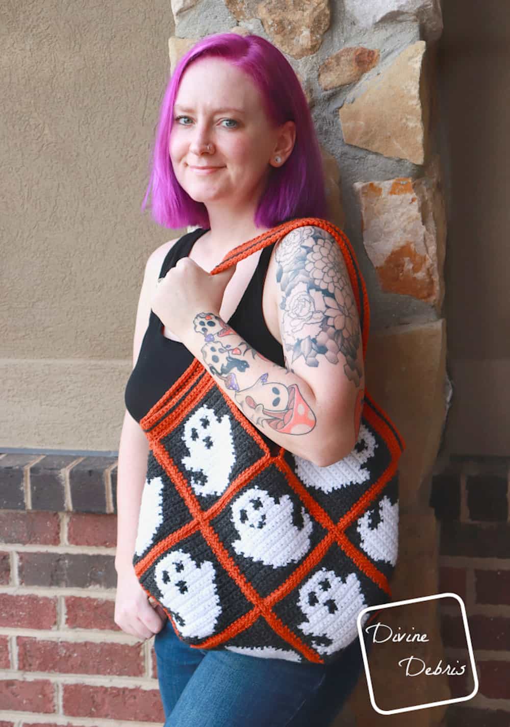 Model with a Halloween ghost bag.