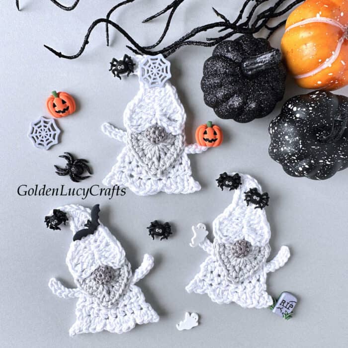 Three crochet Halloween ghost gnomes.