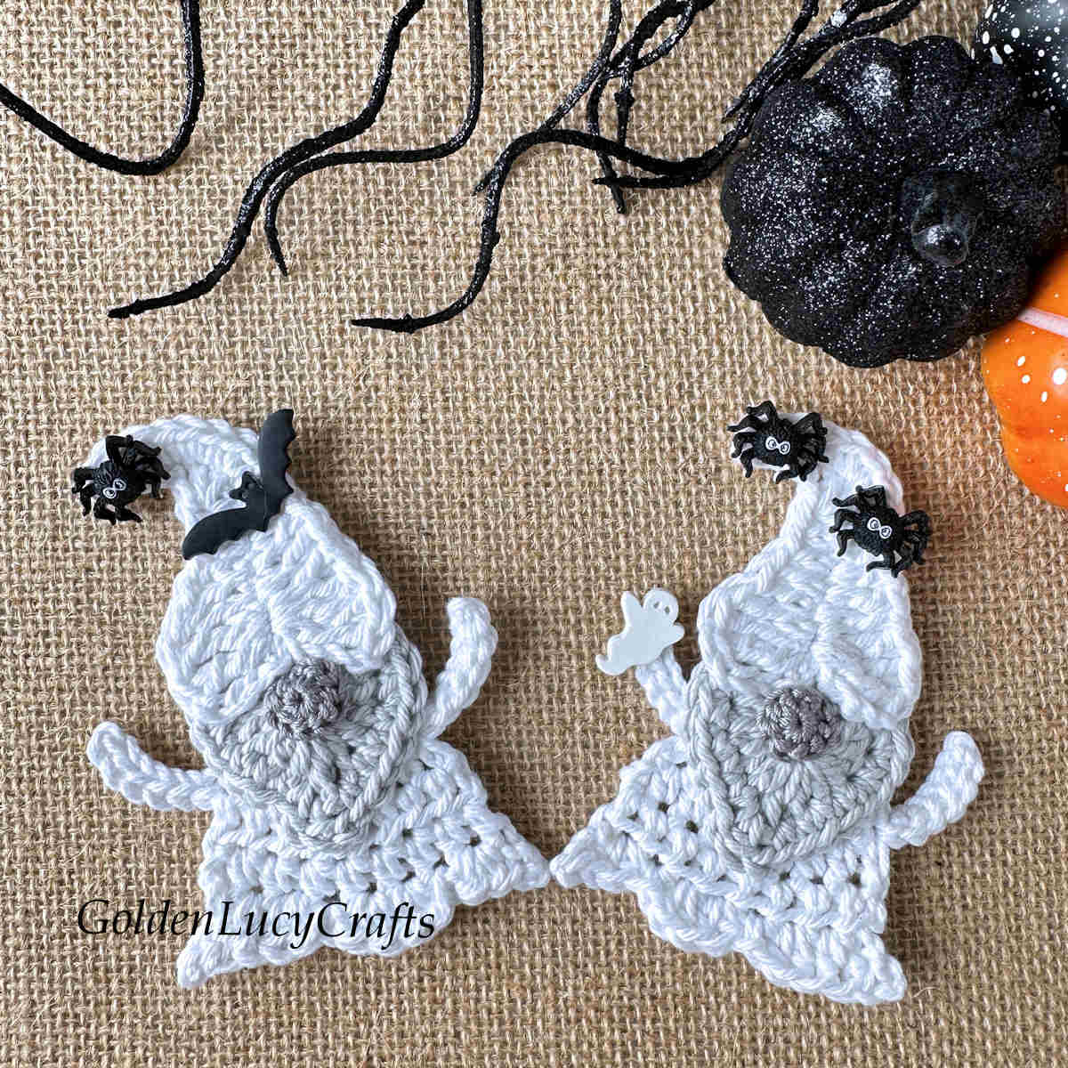 Two crochet Halloween ghost gnomes.