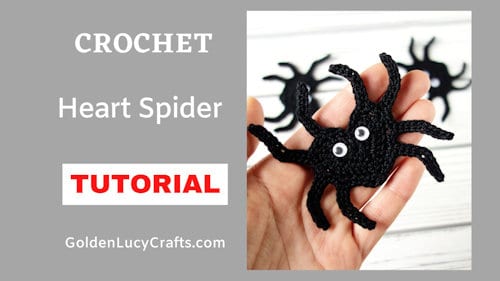 Crochet black spider applique in the palm of a hand, text saying crochet heart spider tutorial goldenlucycrafts dot com.