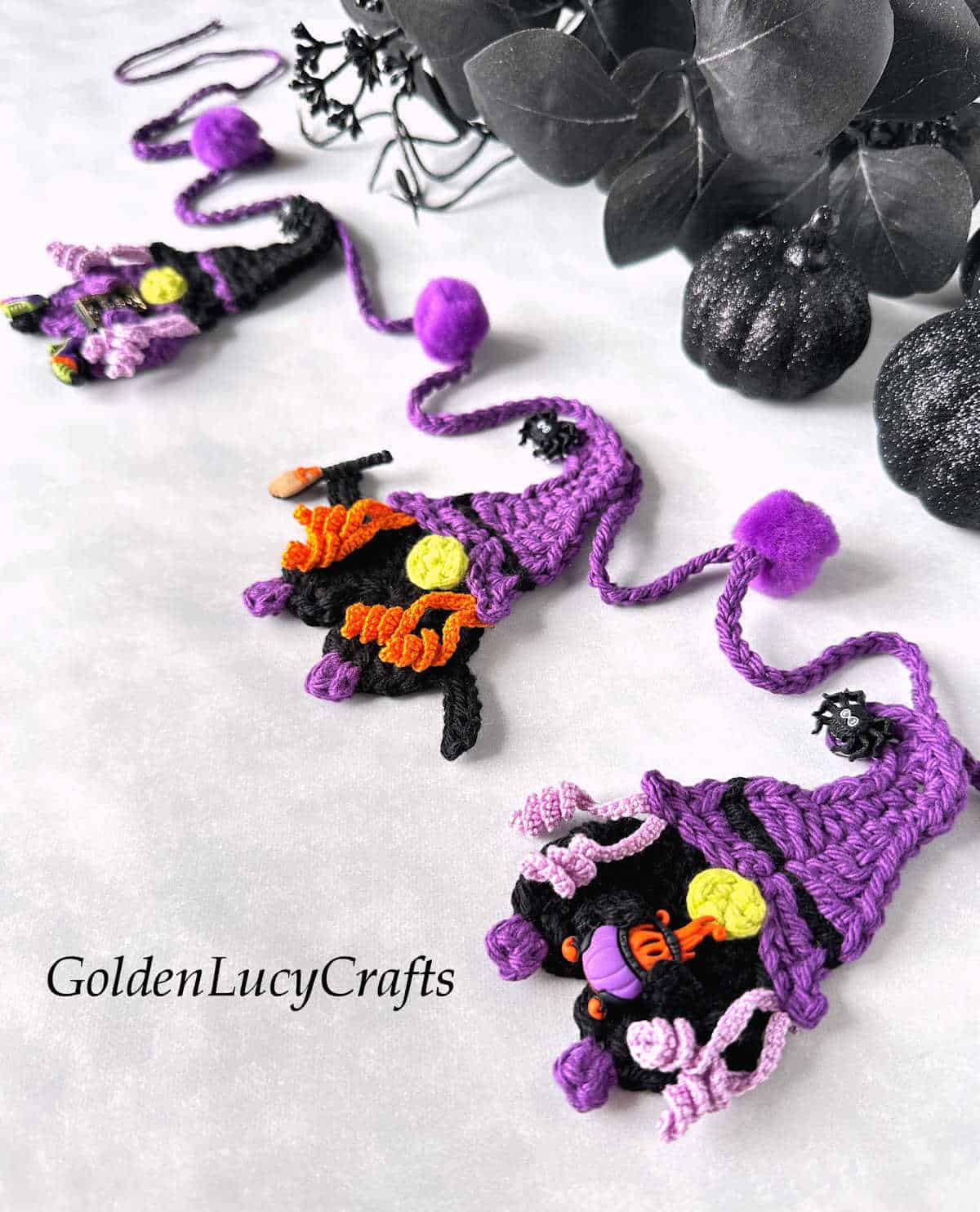 Crochet witch garland close up picture.