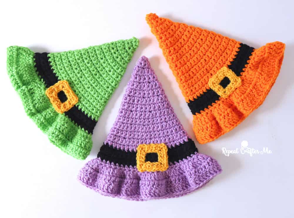 Three crocheted witch hats.