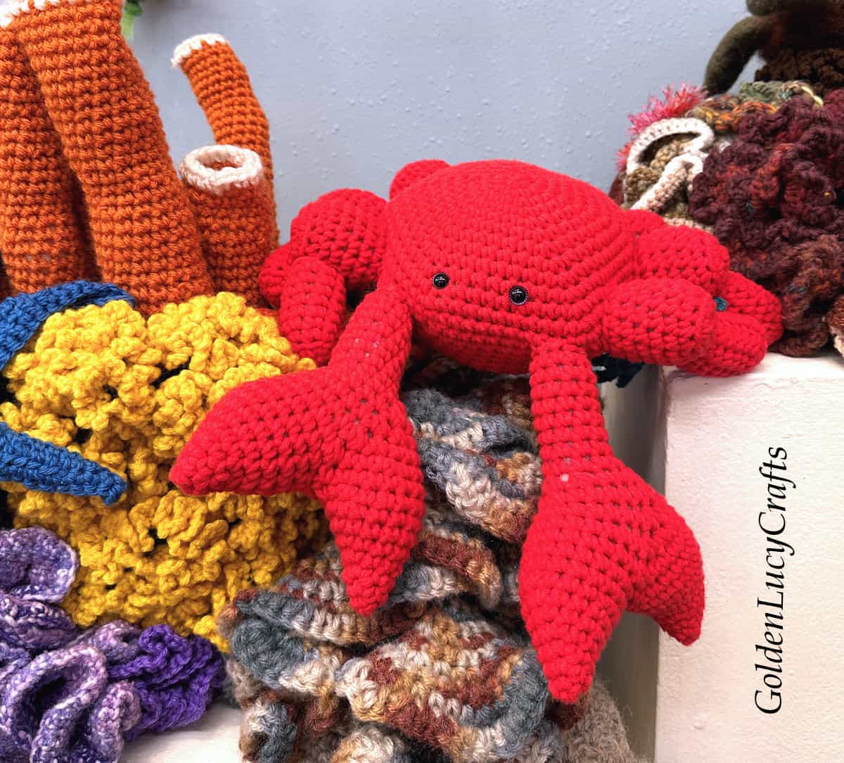 Crocheted corals and crab.