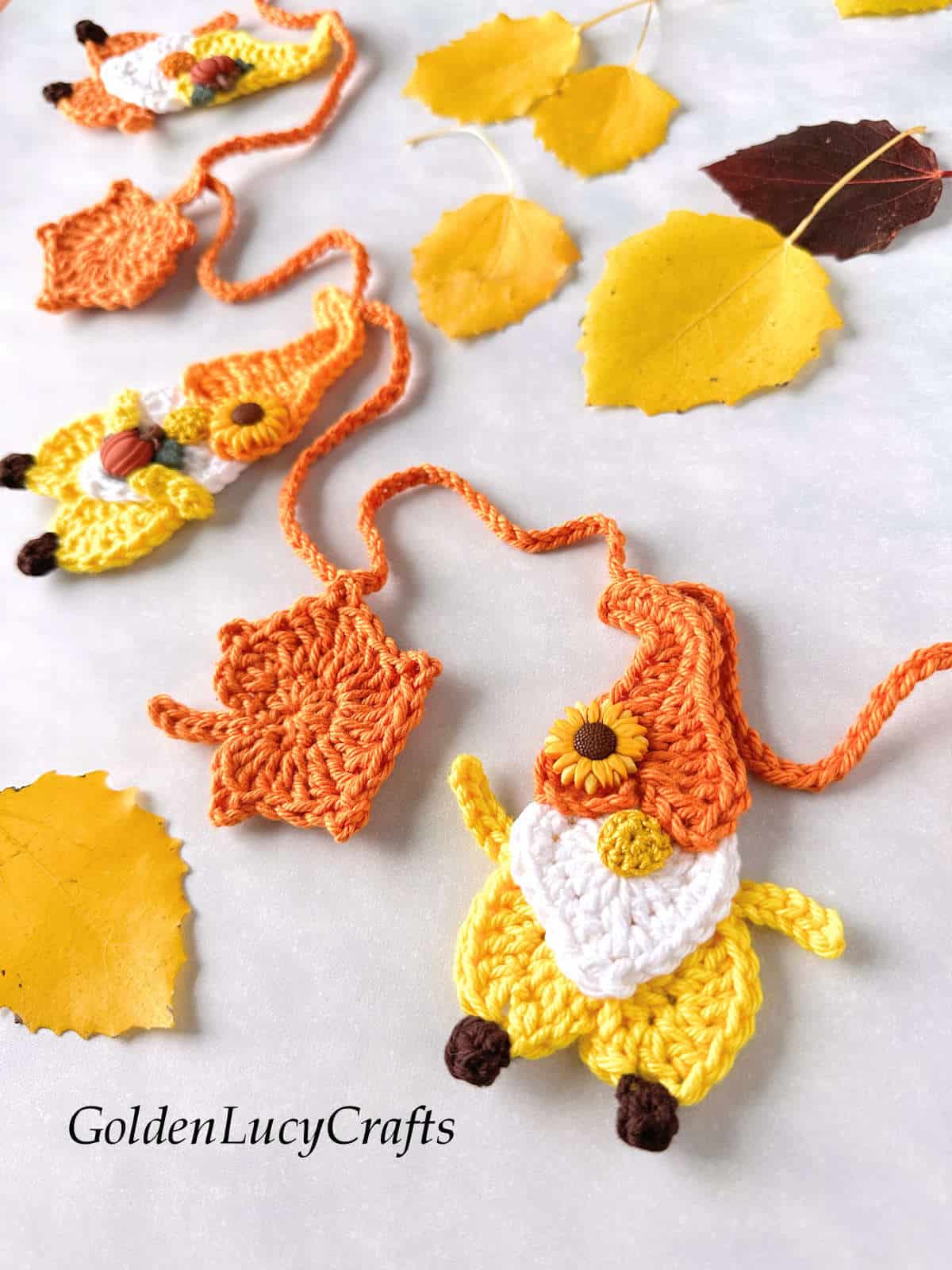 Handmade crocheted Fall garland close up picture.