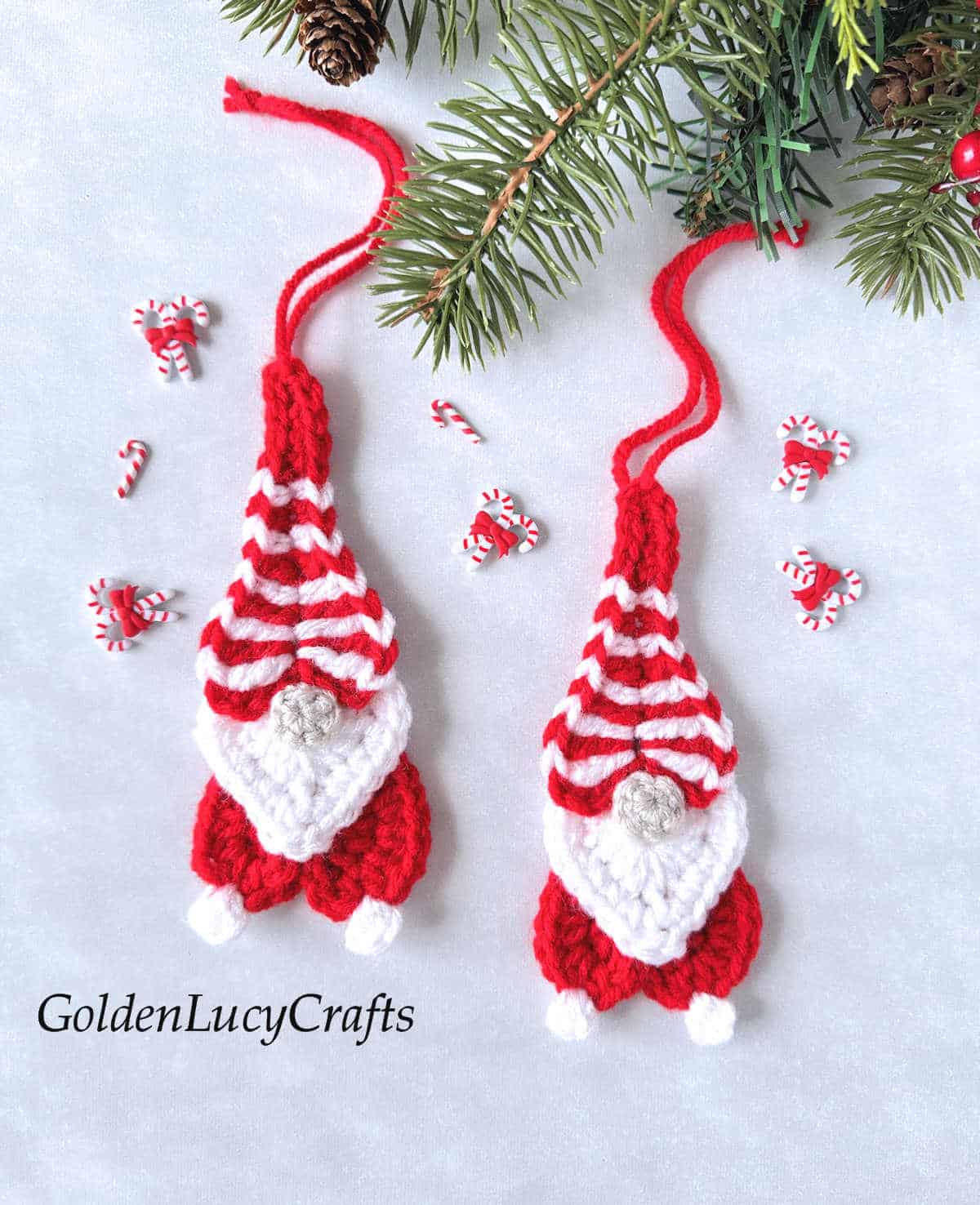 Two crochet candy cane gnomes.