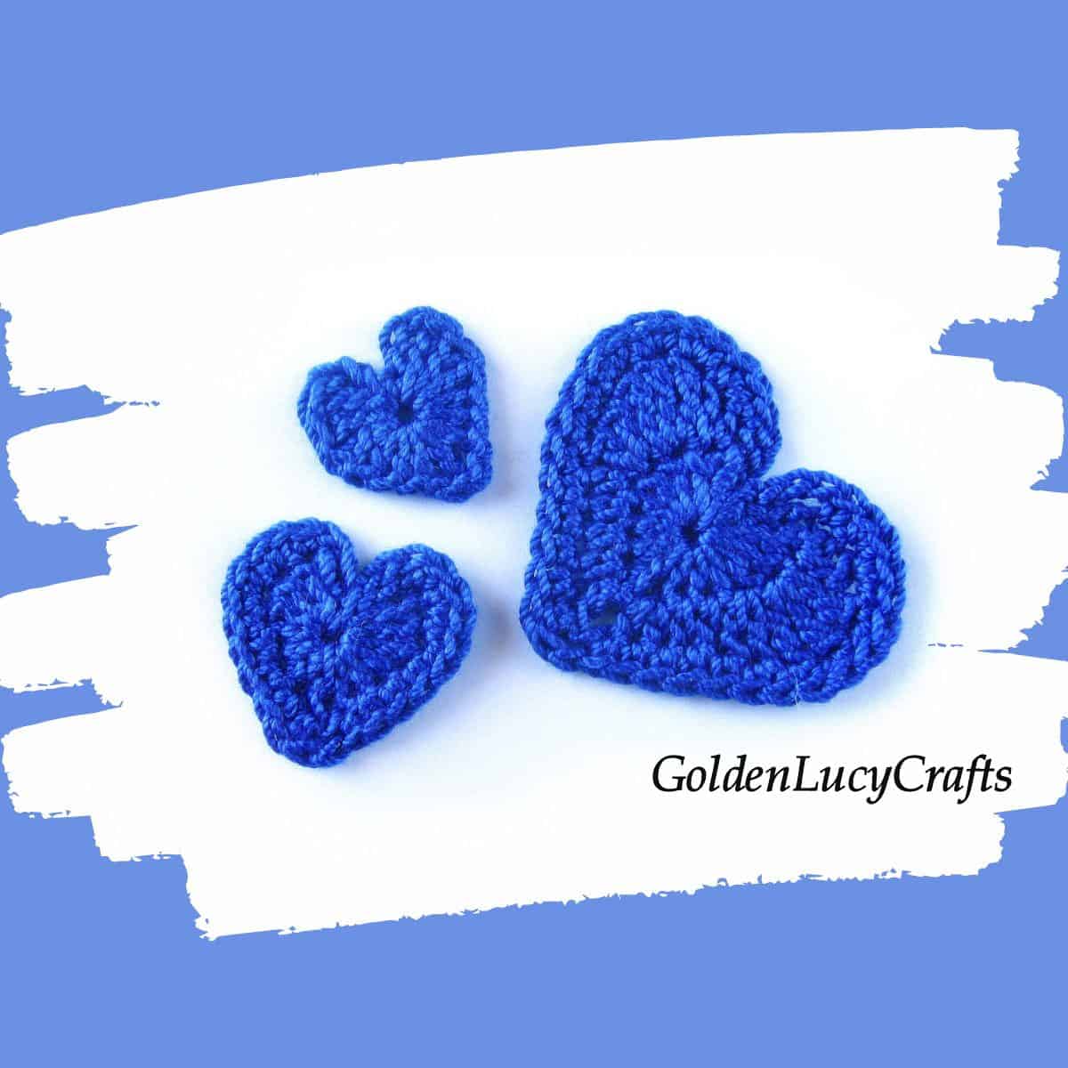 Crochet three blue hearts.