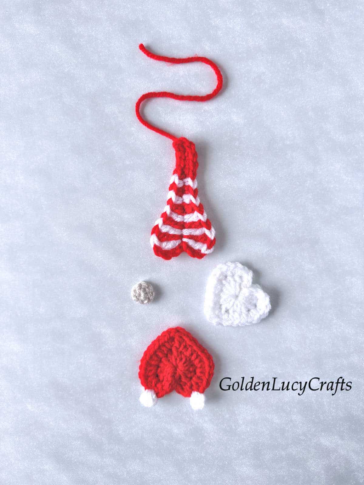 Parts of the crochet candy cane gnome.