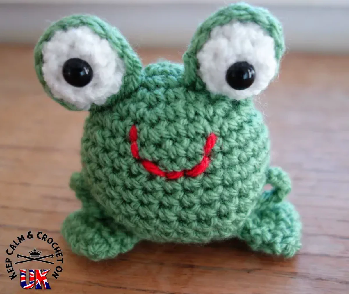 Crocheted frog toy.
