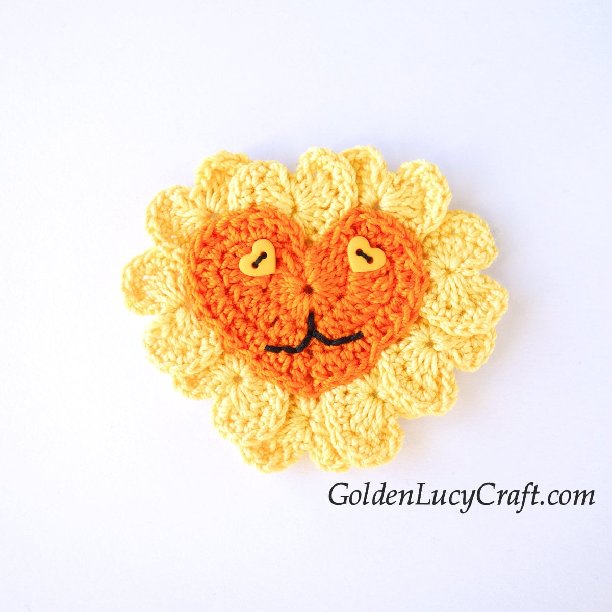 Crochet heart lion applique.
