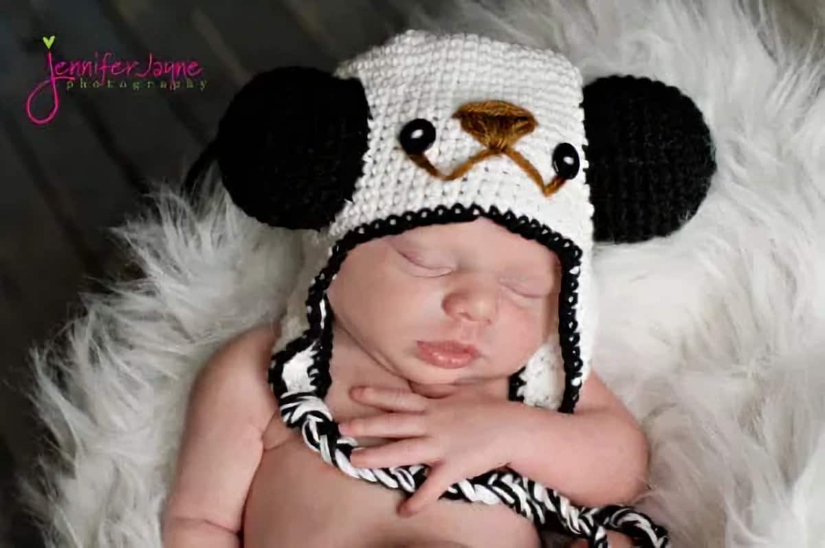Baby in panda hat.