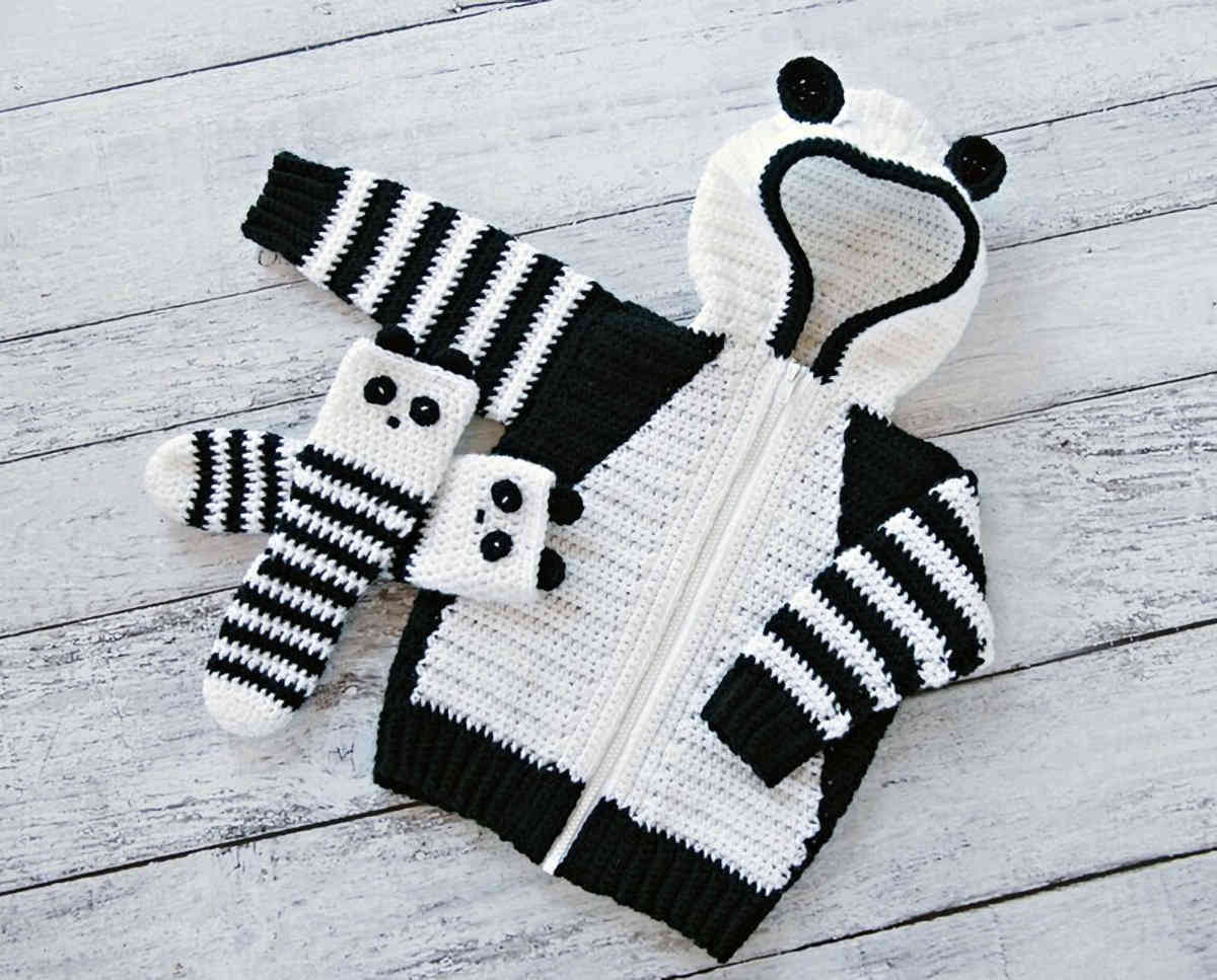 Crocheted black and white kids hoodie and socks.