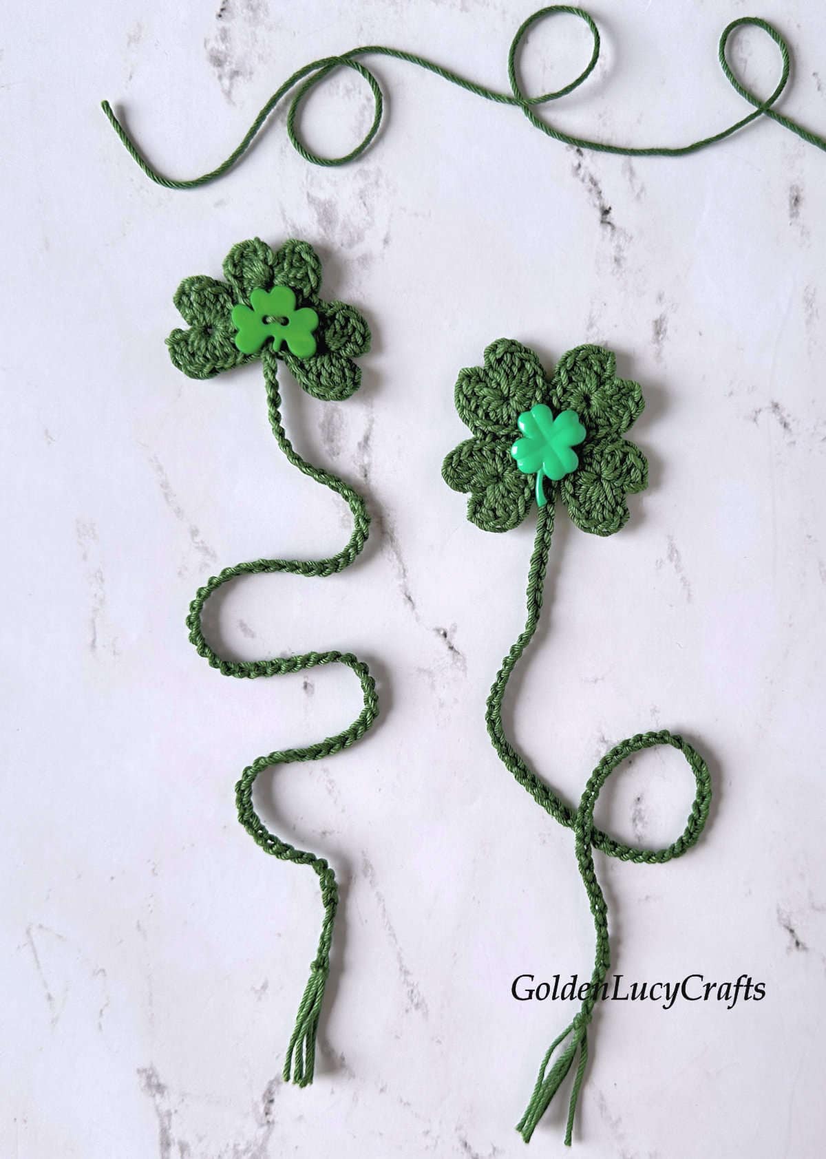 Two crocheted green bookmarks for St. Patrick's Day.