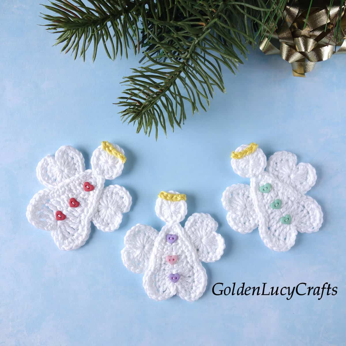 Three crochet angel appliques.
