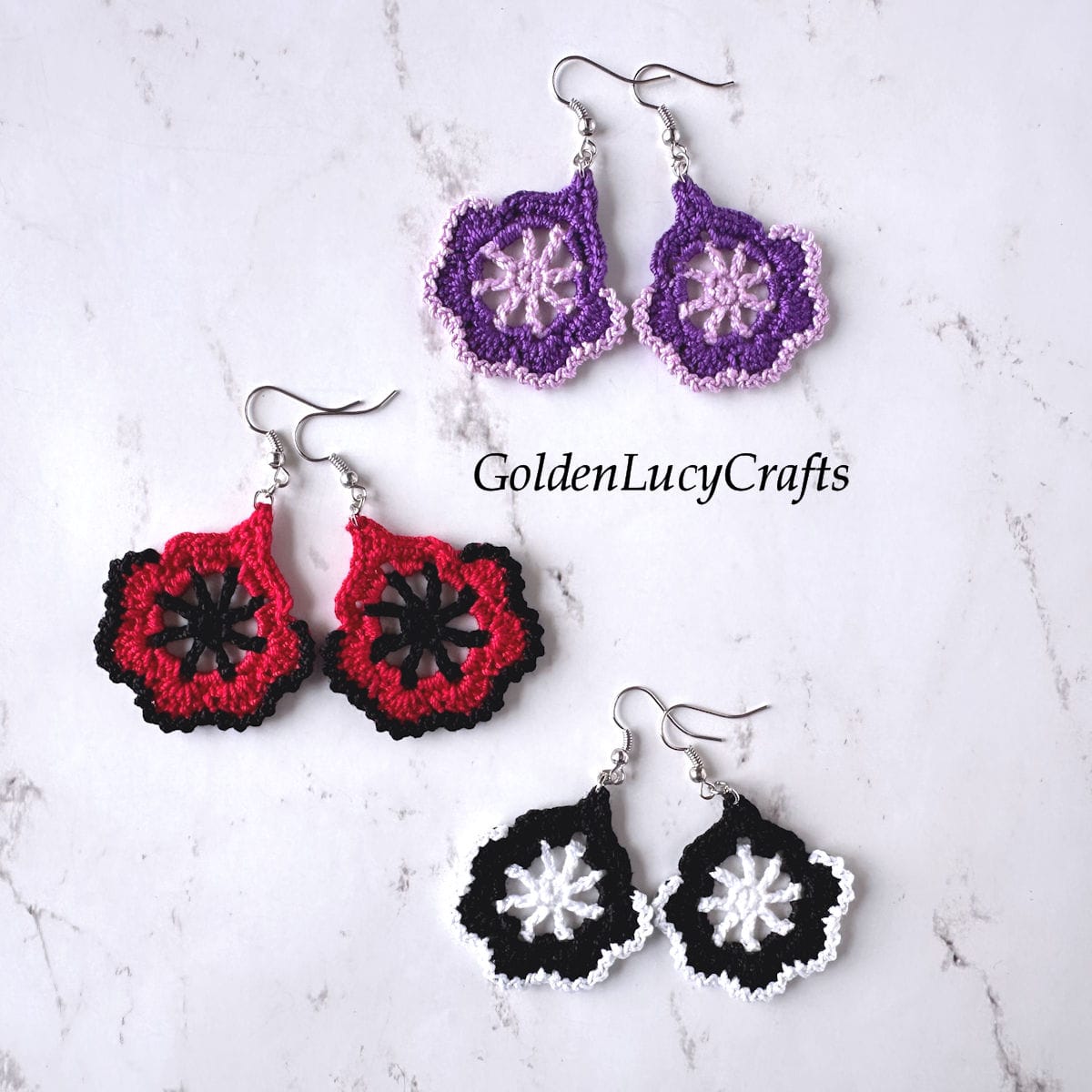Three pairs of crocheted earrings.