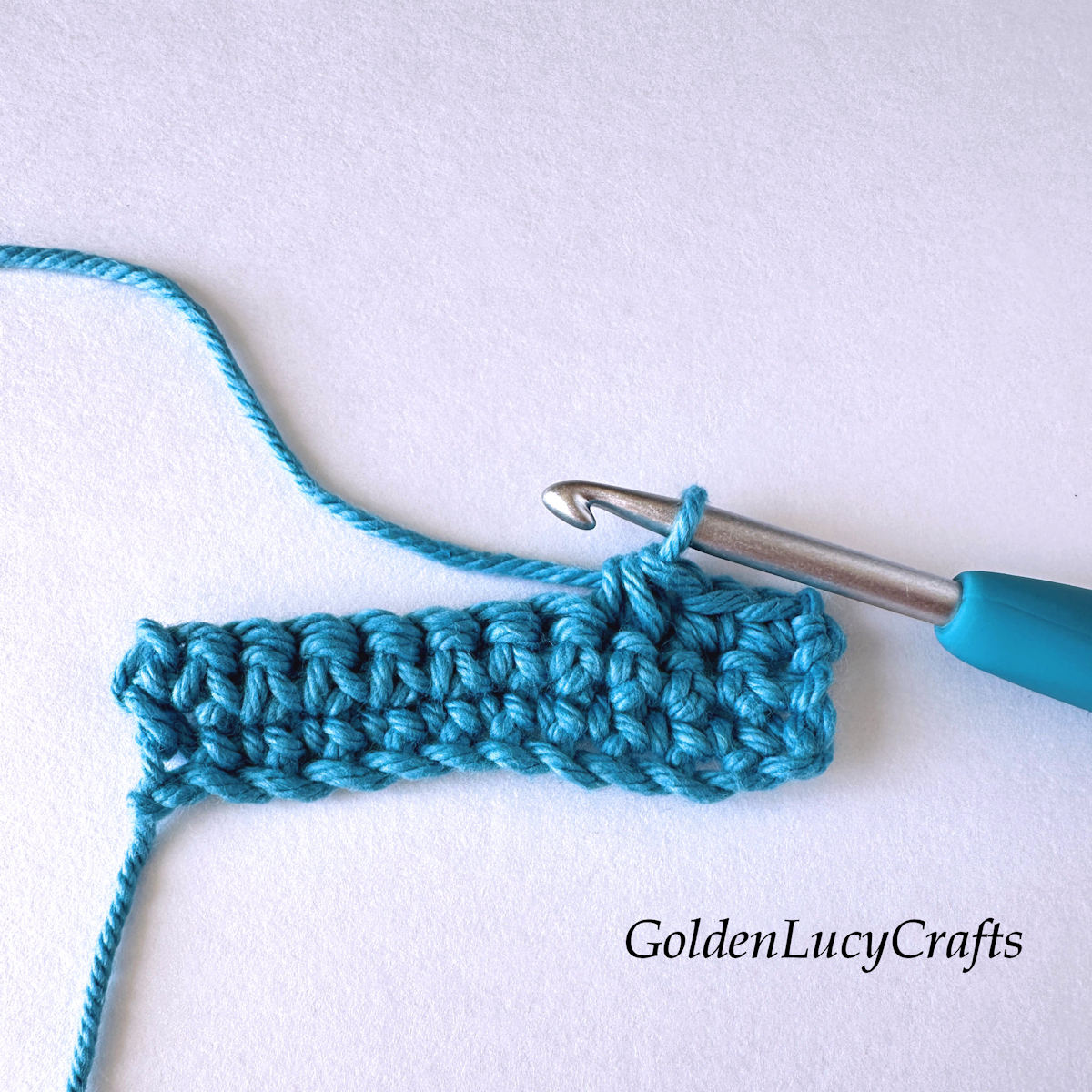 Crochet sample demonstrating finished stitch: single crochet 2 stitches together.