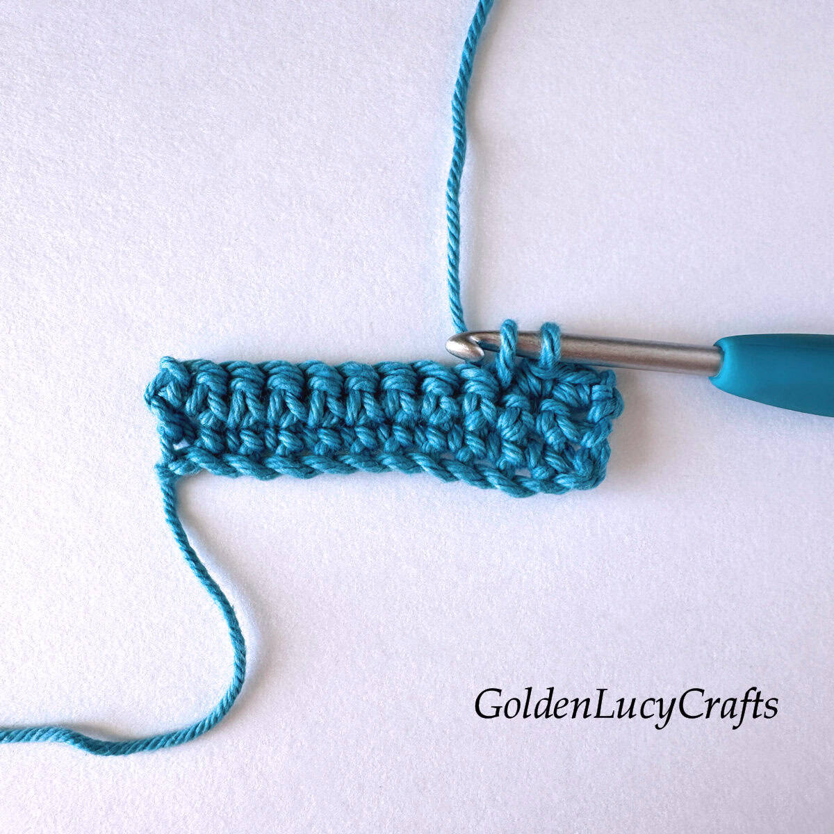 Crochet sample demonstrating Step 3 of how to work single crochet 2 stitches together.