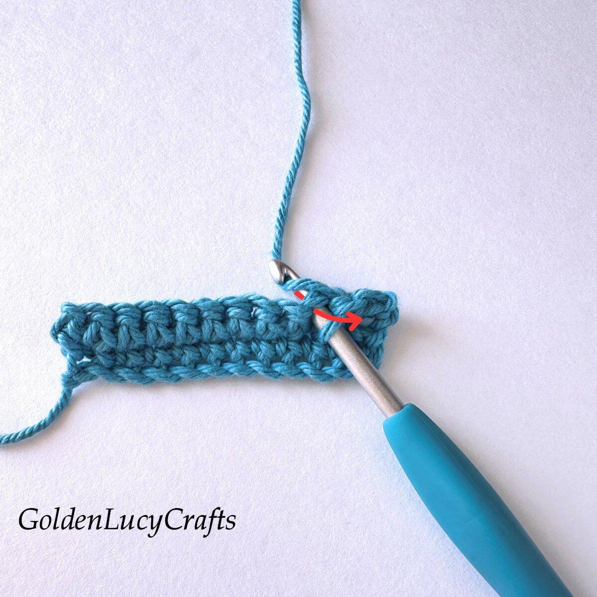 Crochet sample demonstrating Step 5 of how to work single crochet 2 stitches together.