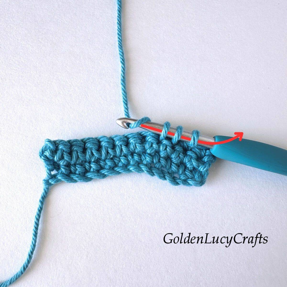 Crochet sample demonstrating Step 7 of how to work single crochet 2 stitches together.