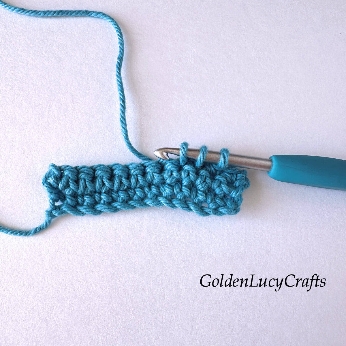 Crochet sample demonstrating Step 6 of how to work single crochet 2 stitches together.