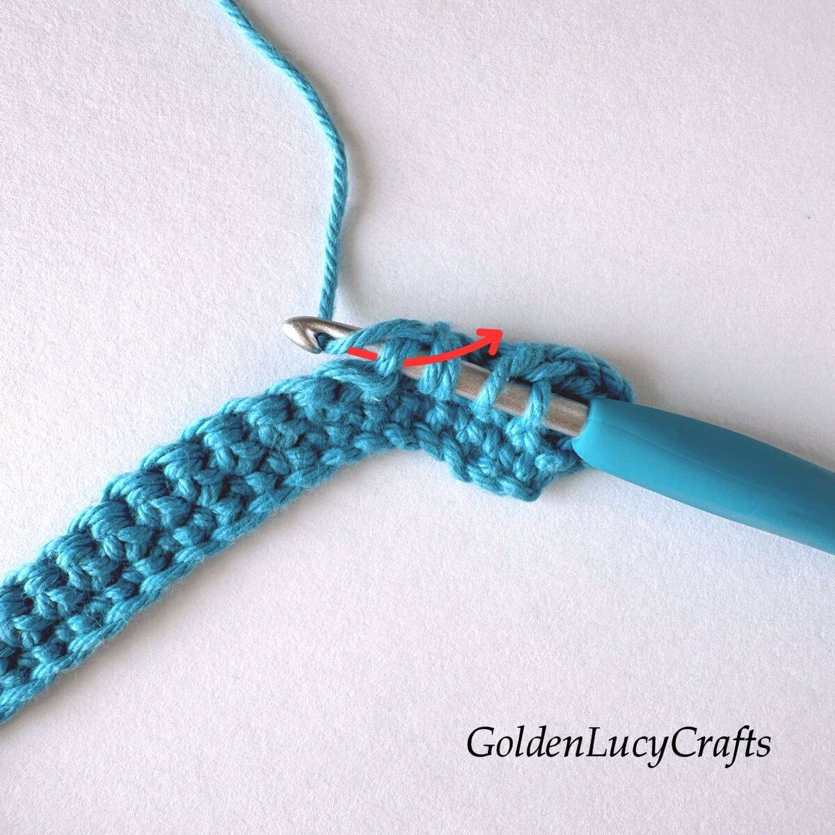 Crochet sample demonstrating Step 5 of how to work half double crochet decrease.