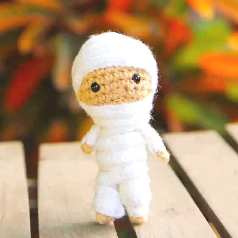 Crocheted mummy amigurumi.