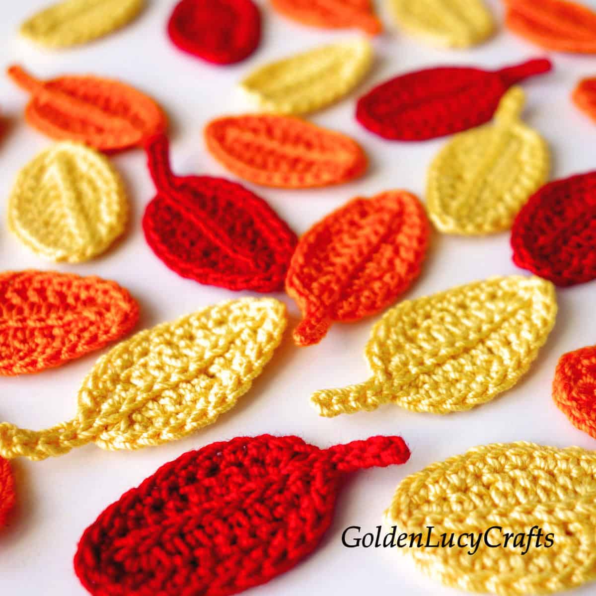 Small crocheted leaves in fall colors.