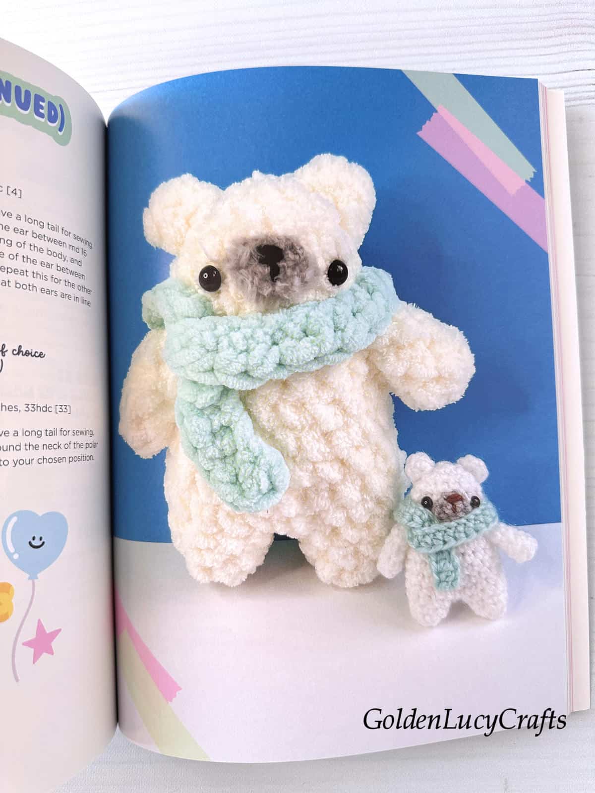 An open book displaying images of large and small crocheted polar bears.